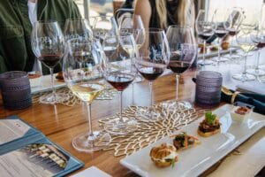 Wine tasting flight with gourmet bites on elegant table