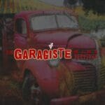 a red truck parked in a field