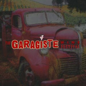 a red truck parked in a field