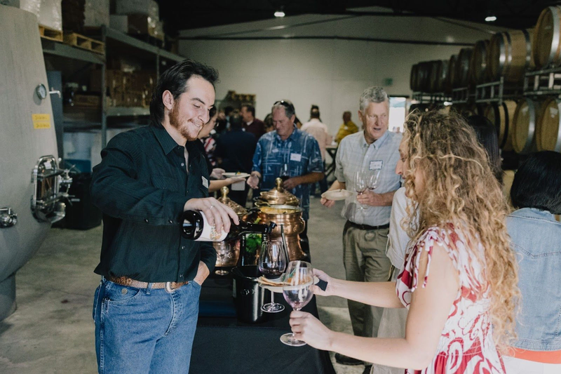 Wine poured at Copia Vineyards barrel room event