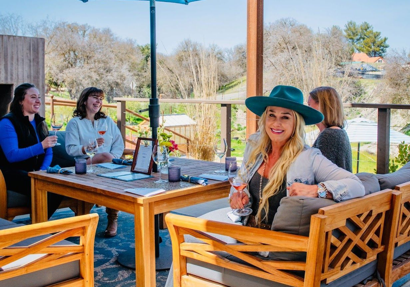 unnamed Guests enjoying wine on Copia Vineyards patio terrace